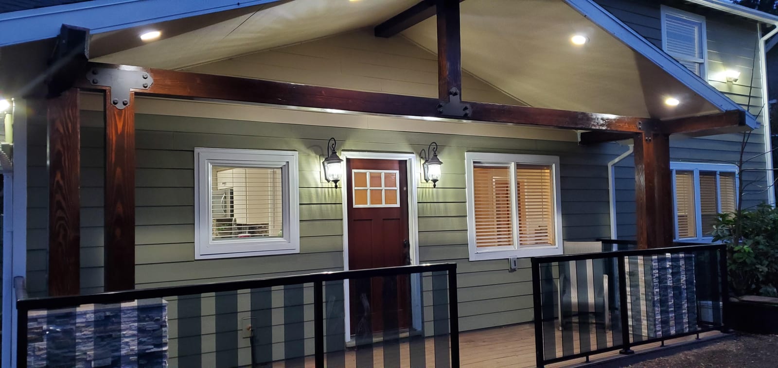 The welcoming front porch of Claudia House